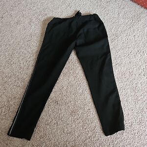 Black tie waist pants with line of sparkly stones going down each pants leg
